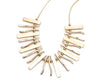 Gold statement necklace and bracelet