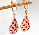 Rose Gold Ruby Stud Earrings